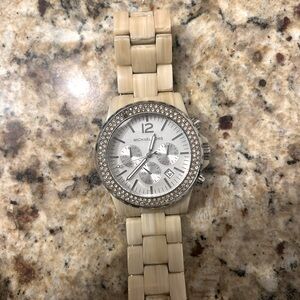 White tortoise Michael Kors watch.